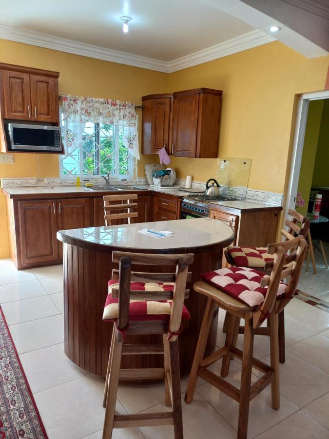 Fully equipped shared kitchen with breakfast island